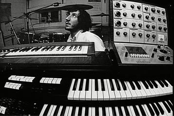 Ca. 1970, home studio, Twickenham, EMS VCS3 mk1 synth, atop Lowrey Berkshire Deluxe TBO-1 organ.