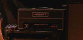 Ca. 1978, Shepperton, view of Big Muff Pi pedal taped on top of rig next to Hiwatt DR103W amplifier.