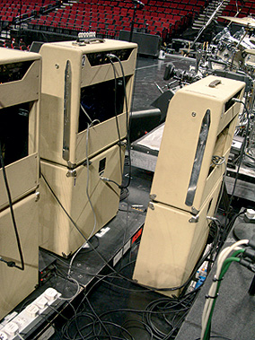 Rear view of amps and extension cabs, with spare stack behind.