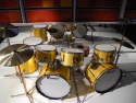 Click to view larger version. Gold Premier kit on display at Grammy Museum, courtesy Lee Harrington. Photo 16 (front)