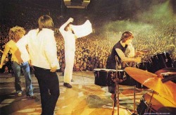 Click to view larger version. December 1973, view of rear (“Quadrophonic”) PA speaker stacks at back of hall (next to Pete’s elbow).