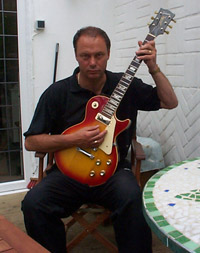 Click to view larger version. Clint Nurse with Les Paul Deluxe
