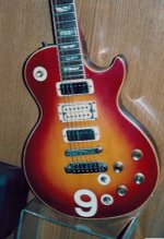 #9 Cherry Sunburst 1975 Gibson Les Paul Deluxe from 1976–79 series, on display at the Hard Rock Hotel, Las Vegas, Nevada. Photo courtesy Brad Rodgers.