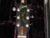 Click to view larger version. A modified 1975 Gibson Les Paul Deluxe. In private collection. – headstock