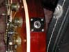 Click to view larger version. A modified 1975 Gibson Les Paul Deluxe. In private collection. – jackplate closeup 2